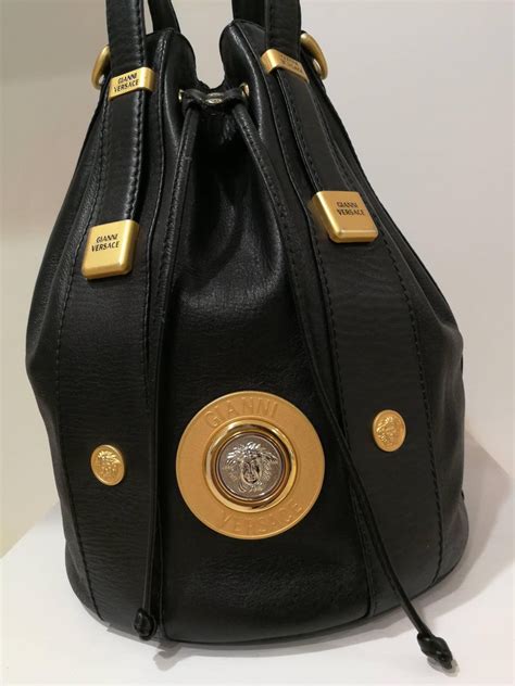 versace bag gold|black Versace purse.